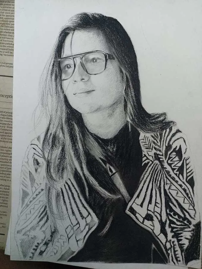 Dramatic charcoal portrait of a man with glasses with high contrast lighting