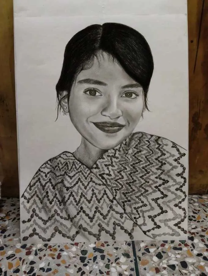 Highly detailed female pencil portrait showcasing realistic hair and facial features